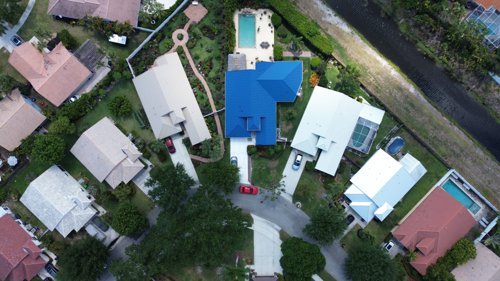 Aerial drone view of a roof coating project in South Florida Aerial drone view of a roof coating project in South Florida
