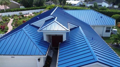 Aerial drone view of a Florida residential roof during inspection