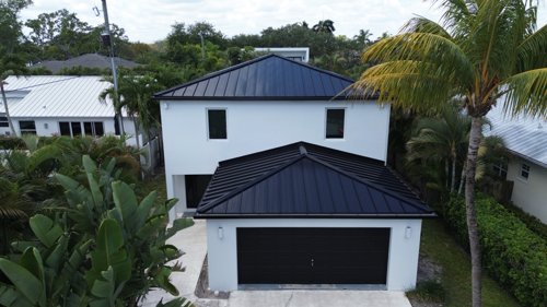 Aerial view of a Florida residential roof before roof coating application Aerial view of a Florida residential roof before roof coating application