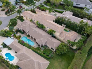 SK Quality Roofing crew installing new shingles in Delray Beach