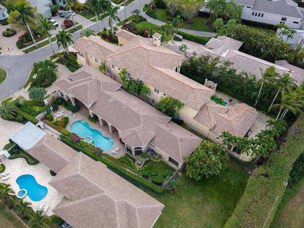 SK Quality Roofing crew installing new shingles in Delray Beach